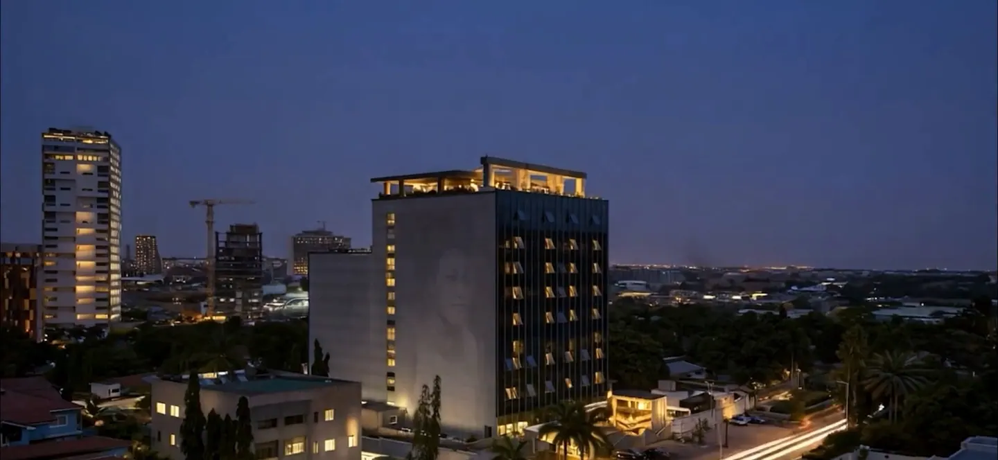 Kwarleyz Residence illuminated above Accra